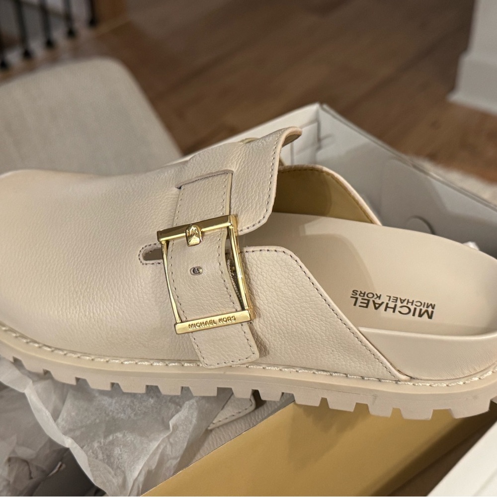 MICHAEL Michael Kors Cream Mules with Gold Buckle